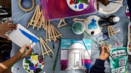 Students paint and learn about the ArtHeels organization during Arts Everywhere Day in 2024.