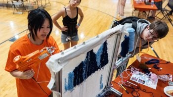 Students show off research and entrepreneurial efforts at the BeAM MakerFest in April 2025.