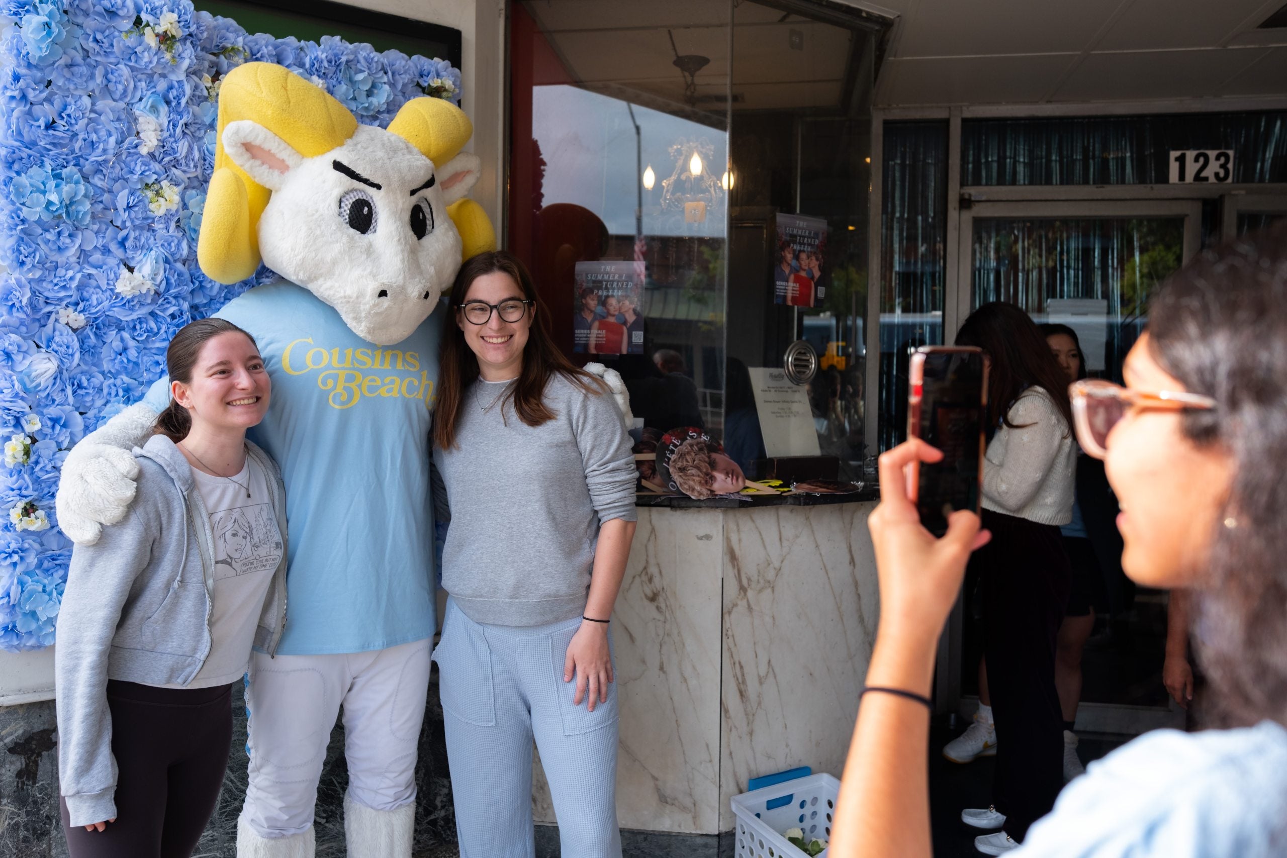 Rameses poses with Carolina students outside the Varsity Theatre before a watch party for "The Summer I Turned Pretty" finale. 
