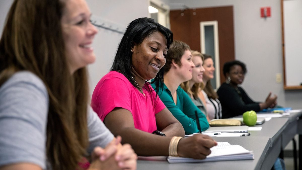 Students smiling in class