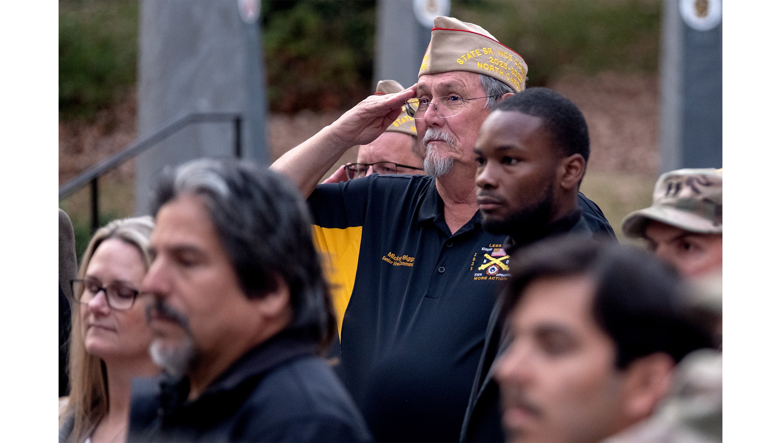 A veteran saluting at the grand opening of the UNC-Chapel Hill Military and Veteran Student Success Center.