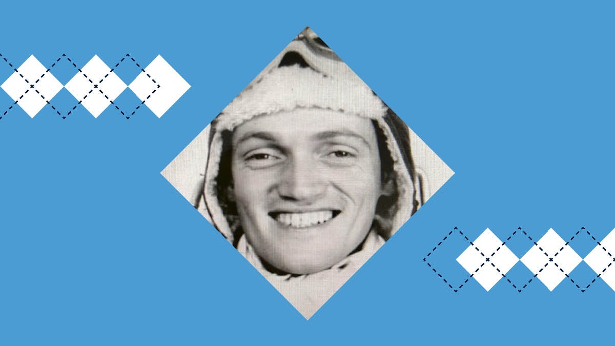 Col. Kelly Francis Cook smiles for a photo wearing his flight uniform.