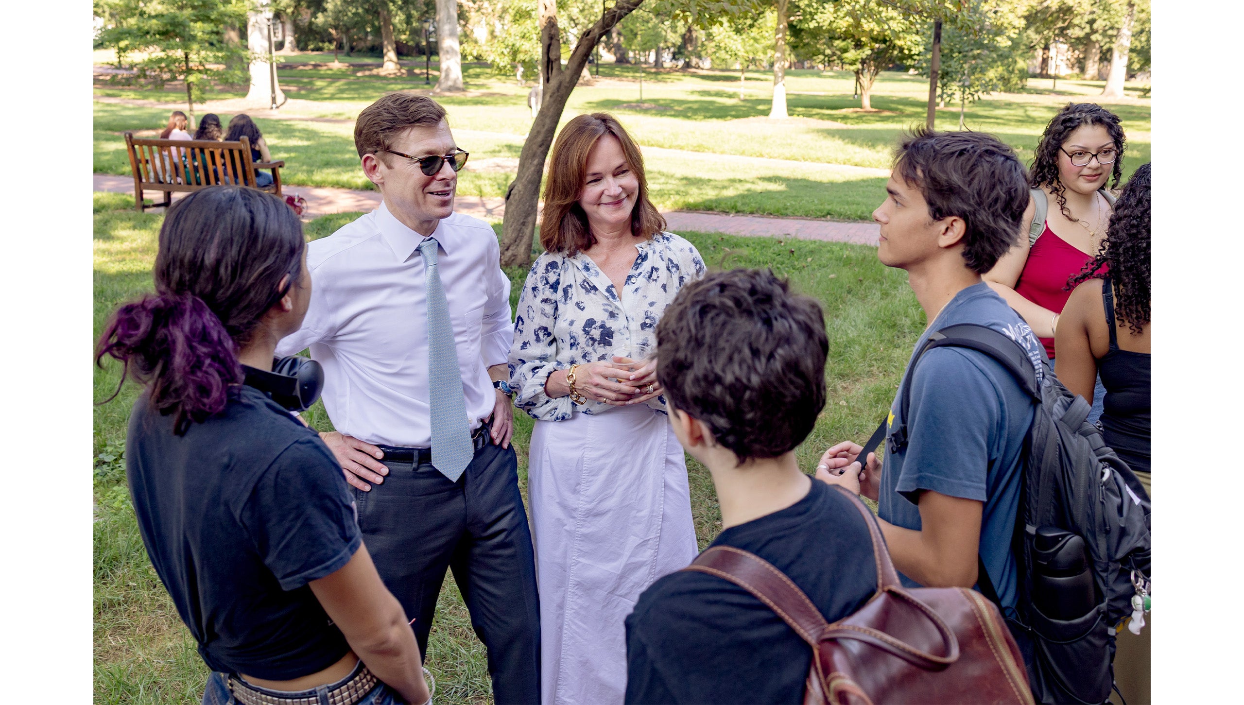 UNC-Chapel Hill Chancellor Lee H. Roberts and wife, Liza, speaking to students waiting in line for their first sip at the Old Well.
