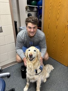 Remington with student athlete.