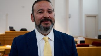Roy Dawson stands in a courtroom in Kinston, North Carolina, where he serves as an attorney.