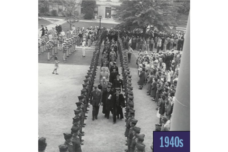 Aerial black-and-white photo of a large crowd of people participating in University Day at UNC-Chapel Hill.