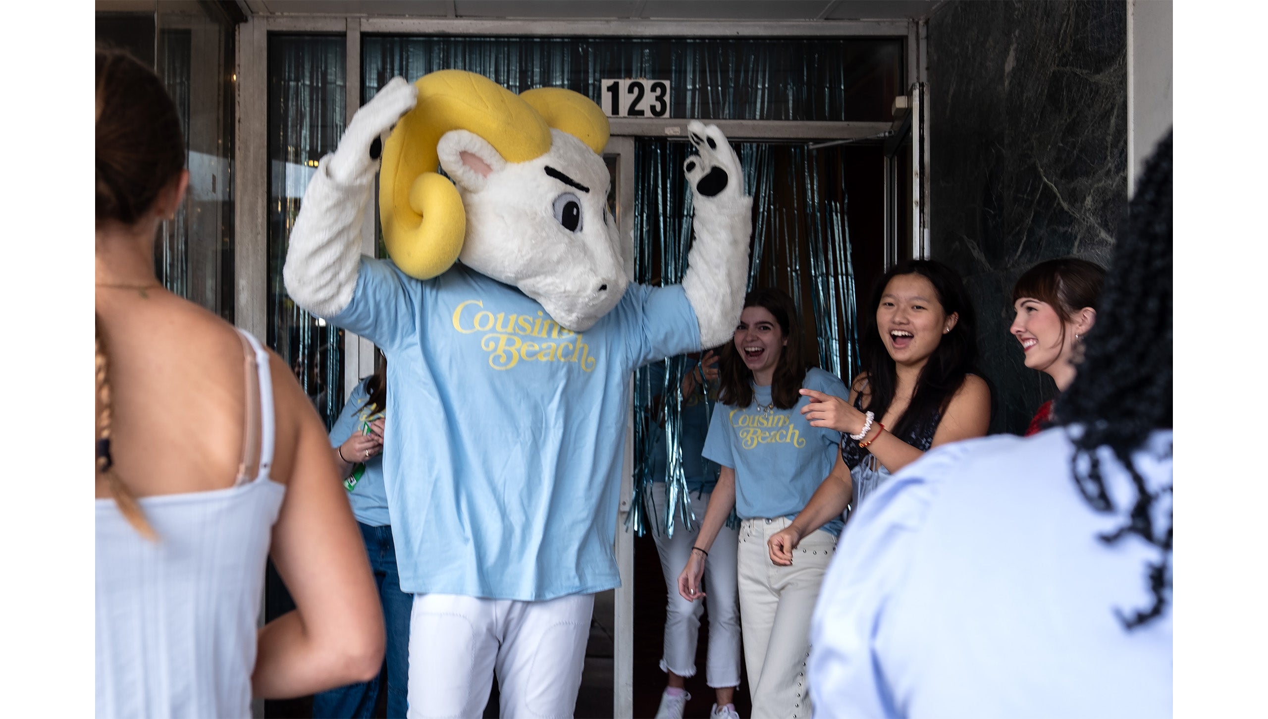 Rameses, UNC-Chapel Hill's mascot, making people laugh outside the Varsity Theatre before “The Summer I Turned Pretty” watch party.