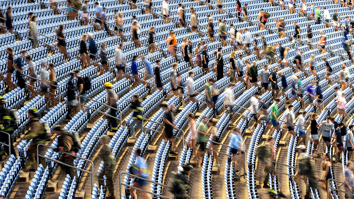 Participants climbing up and down the stairs of Kenan stadium.