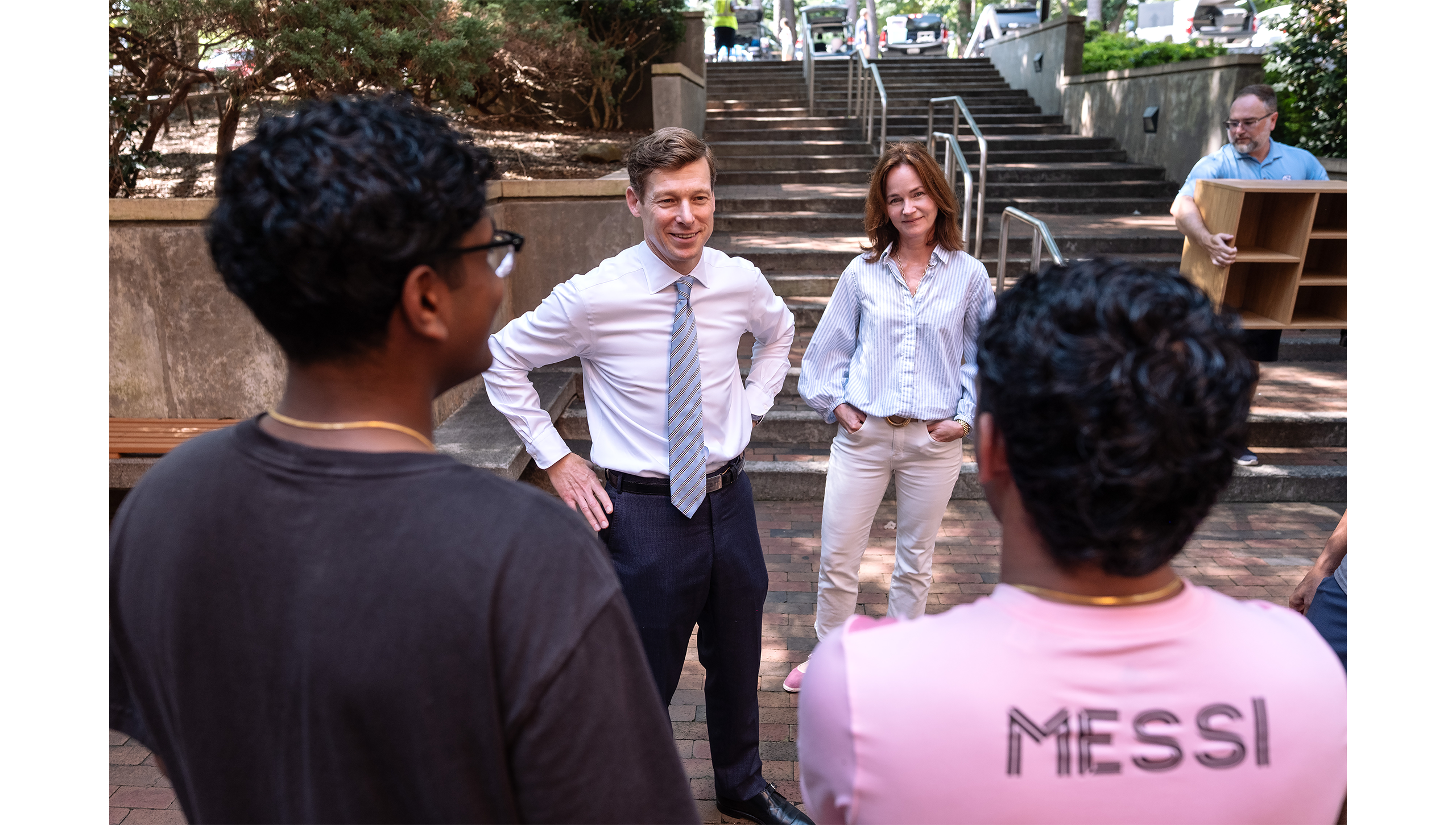 Chancellor Lee Roberts and Liza Roberts talking to students.