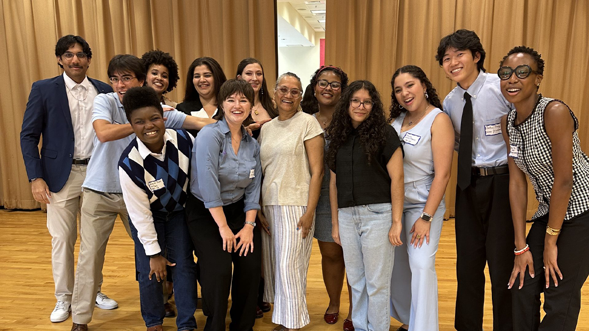 The MURAP 2025 cohort poses for a group photo with MURAP Faculty Director Dr. Kumi Silva. The group stands indoors at the Sonja Haynes Stone Center for Research in Black Culture and History.