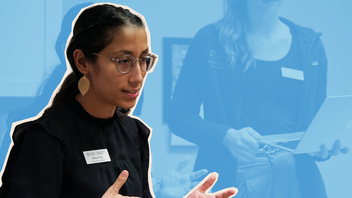 A pharmacology student discusses topics with her group of students.